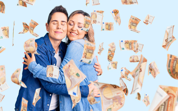 Couple of women wearing casual clothes hugging oneself happy and positive, smiling confident. self love and self care