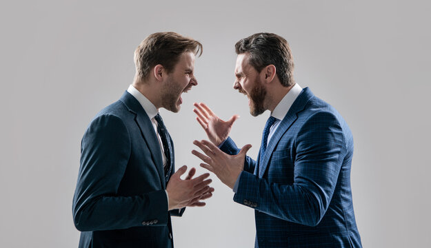 dissatisfied men discuss failure. two colleagues have disagreement and conflict.