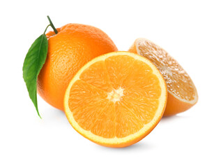 Cut and whole fresh ripe oranges with green leaf on white background