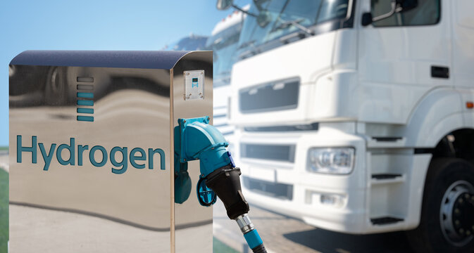 Self service hydrogen filling station on a background of trucks	