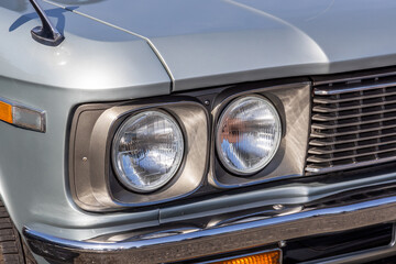 Fototapeta premium 自動車のヘッドライト Headlight of the old car