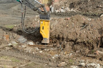 Detail of a jackhammer's head in an excavation.
