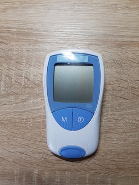 HEILIGENHAUS, NRW, GERMANY - NOVEMBER 30, 2018:
Coagulation Self Management with the CoaguChek.
Medical device for the determination and monitoring of blood clotting.