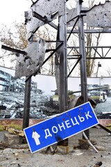 Fototapeta premium Donetsk city in Ukraine, armed conflict, military operations, Escalation in Donbas, vehicle wreck, armored,