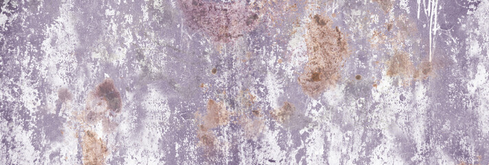 Concrete wall. Weathered old paints on the spilled wall.