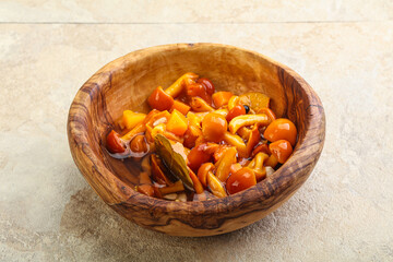 Marinated pickled honey mushrooms in the bowl