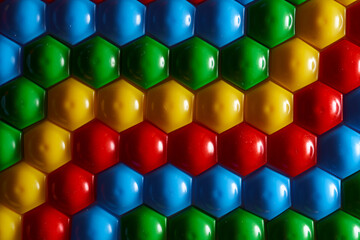Colored childrens mosaic. Colorful background. Macro effect photo.