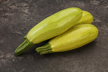 Young tasty zucchini over board