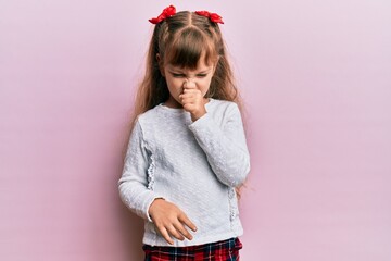Little caucasian girl kid wearing casual clothes feeling unwell and coughing as symptom for cold or bronchitis. health care concept.