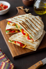 Quesadilla with chicken, tomatoes, corn, cheese and chilli. Mexican food. Fast food.