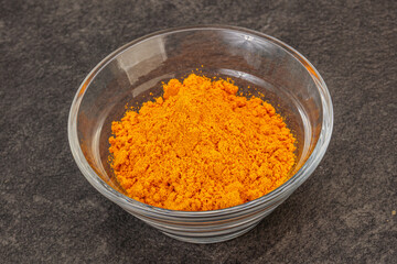 Tumeric powder in the bowl