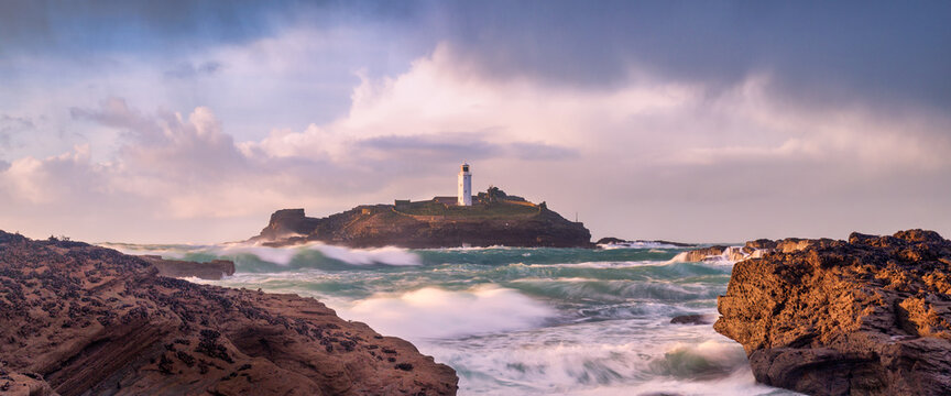godrevy lighthouse at sunset cornwall England uk slow exposure 