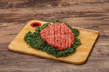 Raw beef burger cutlet for cooking