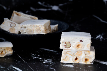 
Torrone - soft italian nougat with almonds. Christmas sweet