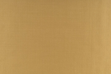 flat surface of beige fabric for sewing clothes, background, texture