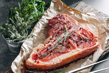 Raw fresh meat t-bone steak with spices