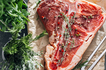 Raw fresh meat t-bone steak with spices