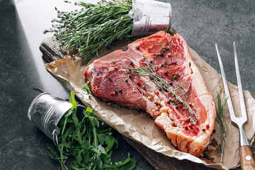 Raw fresh meat t-bone steak with spices