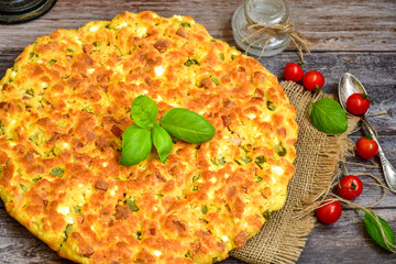  Homemade  frittata  omelette  with potatoes and organic bio eggs,ham,cheese and   cherry tomatoes and fresh  ruccola. 