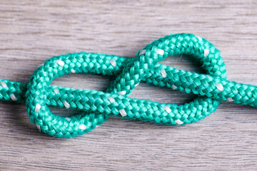 figure-of-eight knot, sailors world, rolling hitch. Ropes on sail boat board, yacht equipment.