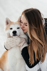 Beautiful woman with akita dog