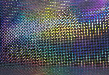 glitter pattern background, rainbow holographic foil texture, colorful hologram surface.
