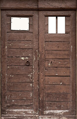 Dirty broken mystical gateway. Messy uneven facade of cracked wood panels in rural town. Fractured retro castle doorway. Flaked grungy slats of barn shabby gate. Destroyed grimy entry of rustic ranch