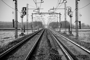 Perspective view of a railway in the countryside.