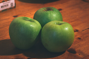 Three apples on the table