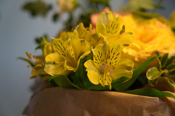 a beautiful bunch of flowers with roses and orchids