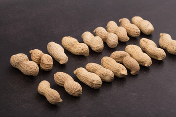 Dried peanuts with shells. Close up image.