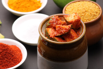 Homemade Mango Pickle or aam ka achar Kairi Loncha with Ingredients.