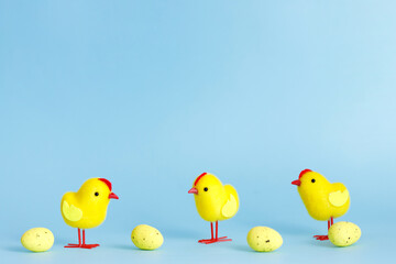 Beautiful blue easter background with chicks. Spring nature backdrop. Festive decorations. Cartoon easter background with chickens for decorative design.