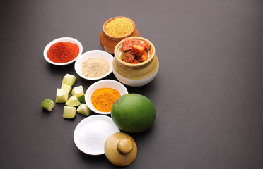 Homemade Mango Pickle or aam ka achar Kairi Loncha with Ingredients.