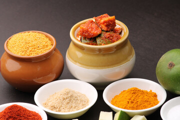 Homemade Mango Pickle or aam ka achar Kairi Loncha with Ingredients.