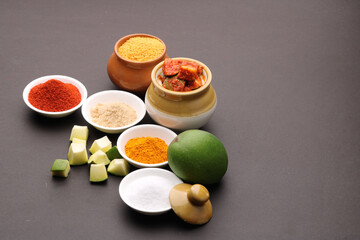 Obraz na płótnie Canvas Homemade Mango Pickle or aam ka achar Kairi Loncha with Ingredients.