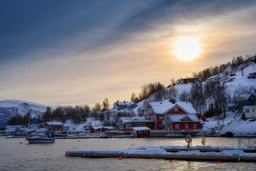 Lyngseidet village harbor at sunset in Northern Norway