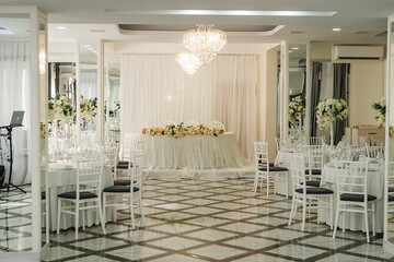 beautiful restaurant for a wedding decorated with flowers