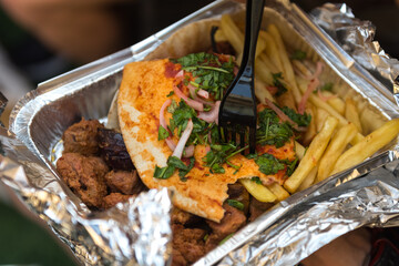 Tasty Lebanese food. Eating outdoor.