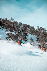 Man skiing with a blue sky