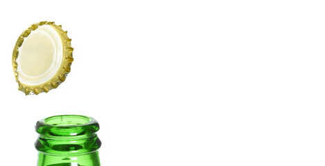 Open green glas bottle isolated on white background