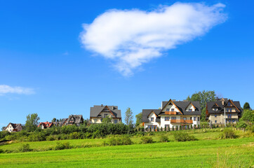 Fototapeta premium Spring landscape with houses