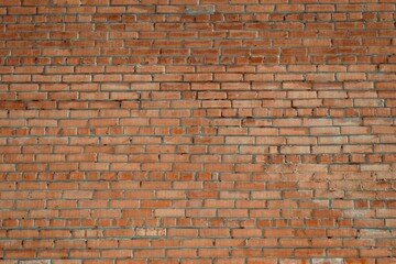 Old orange brick wall background 