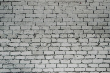 Painted old white brick wall