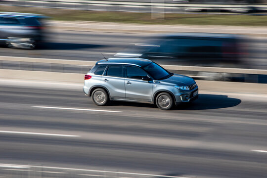 Ukraine, Kyiv - 3 March 2021: Gray Suzuki Vitara car moving on the street;