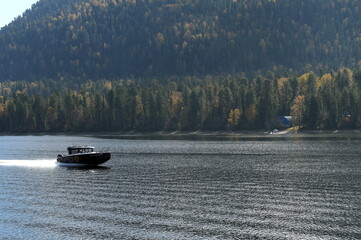 Fototapeta premium Boat on Lake Teletskoye. Altai Republic. Western Siberia
