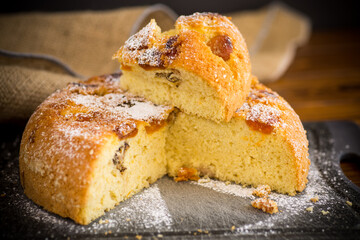 cooked sweet biscuit with dried apricots and nuts inside