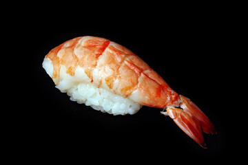 sushi with shrimp isolated on black background healthy dietary food