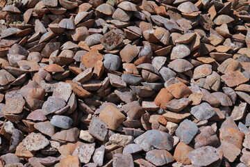 pile of rusty pig iron ingots
