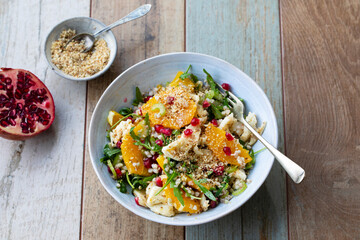 Salad with buckwheat, orange and pomegranate seeds